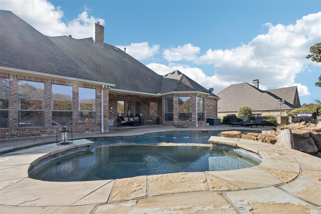 3611 Skinner Road Midlothian, TX 76065 - Photo 29 of 40 a view of a house with swimming pool and sitting area