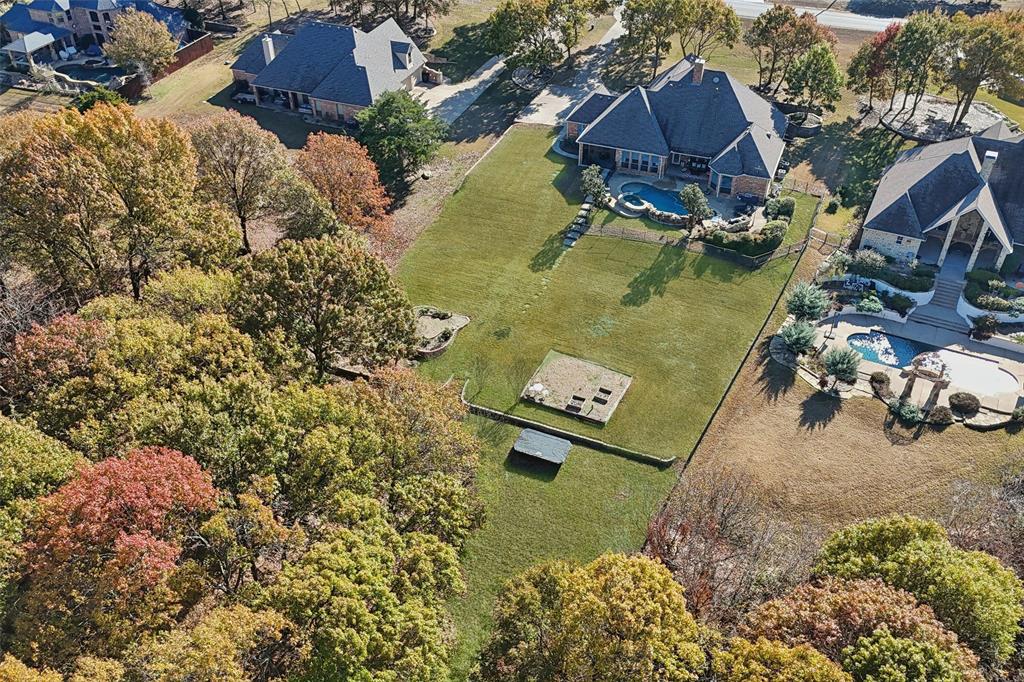 3611 Skinner Road Midlothian, TX 76065 - Photo 32 of 40 an aerial view of a house with a yard swimming pool and outdoor seating