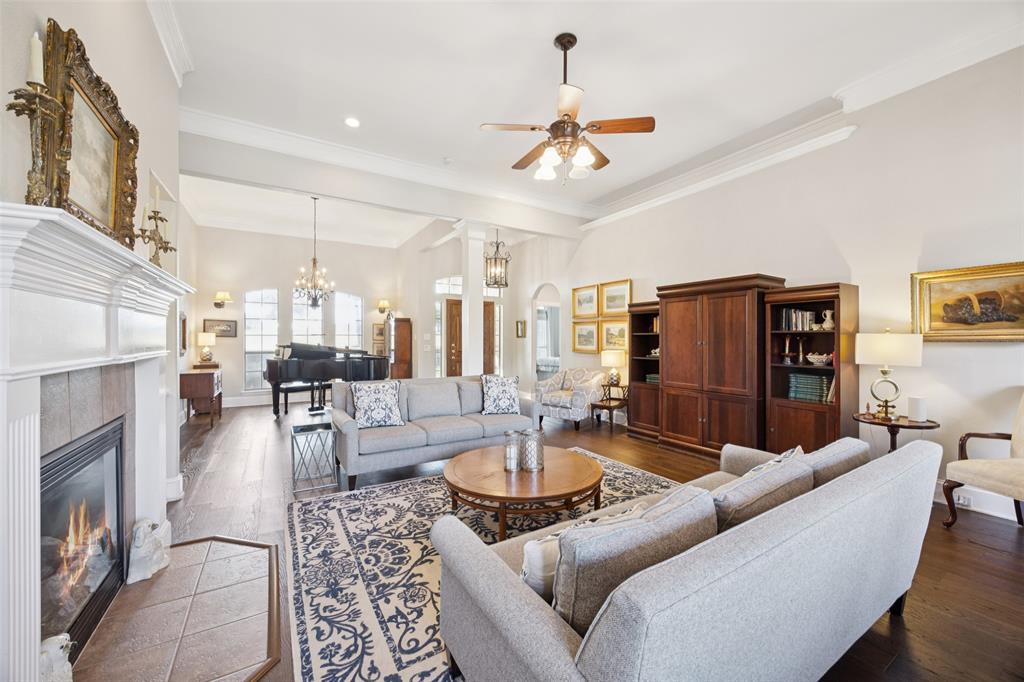 3611 Skinner Road Midlothian, TX 76065 - Photo 5 of 40 a living room with furniture and a fireplace