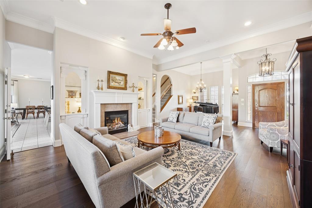 3611 Skinner Road Midlothian, TX 76065 - Photo 8 of 40 a living room with furniture and a fireplace