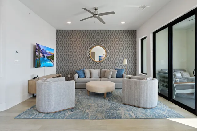 a living room with couches and a coffee table