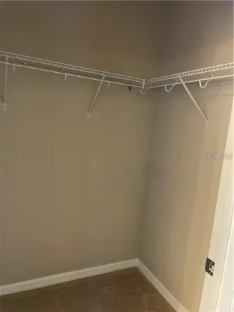 a view of a room with racks on the wall