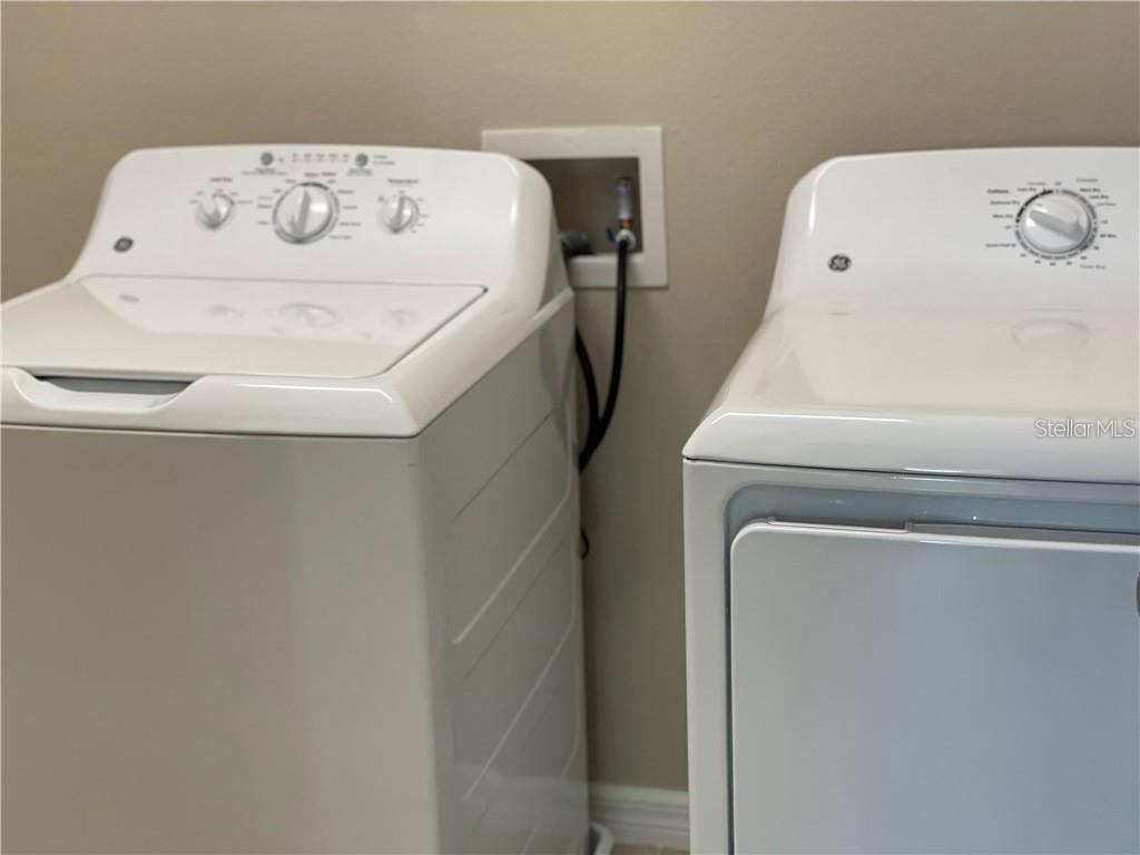 13823 Messina Loop, Unit 203 Bradenton, FL 34211 - Photo 15 of 15 a utility room with dryer and washer