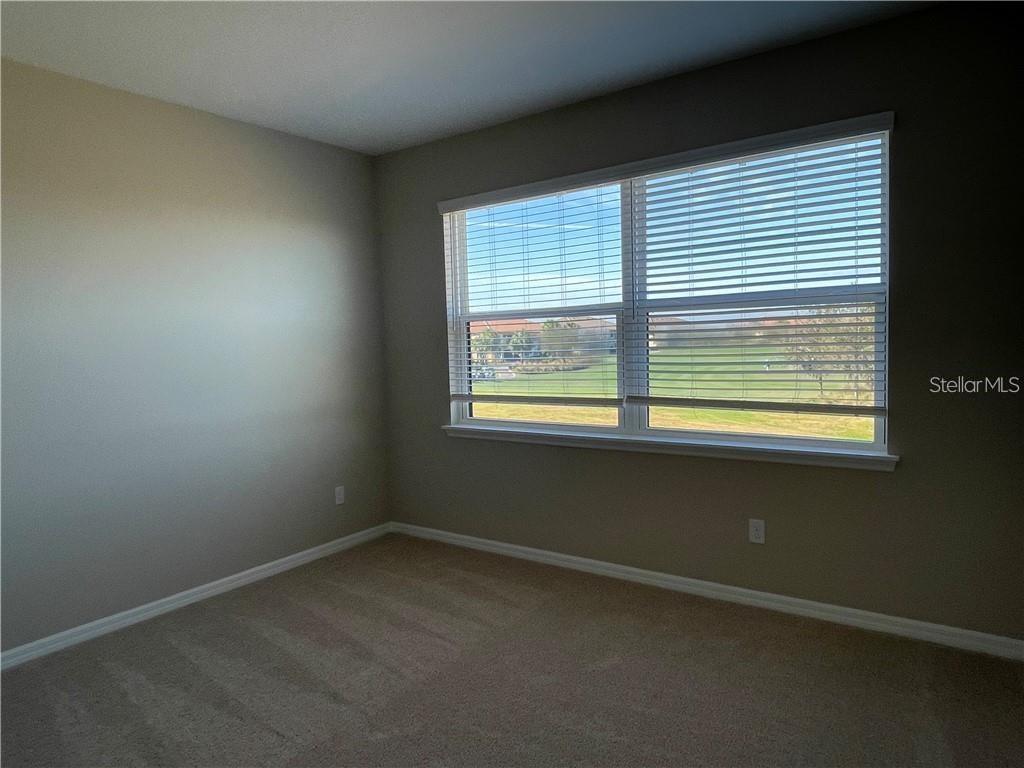 13823 Messina Loop, Unit 203 Bradenton, FL 34211 - Photo 8 of 15 an empty room with a window