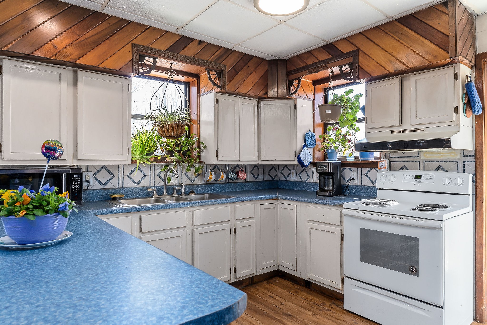 5980 Ashburn Road Baxter, TN 38544 - Photo 15 of 65 a kitchen with a sink cabinets and window