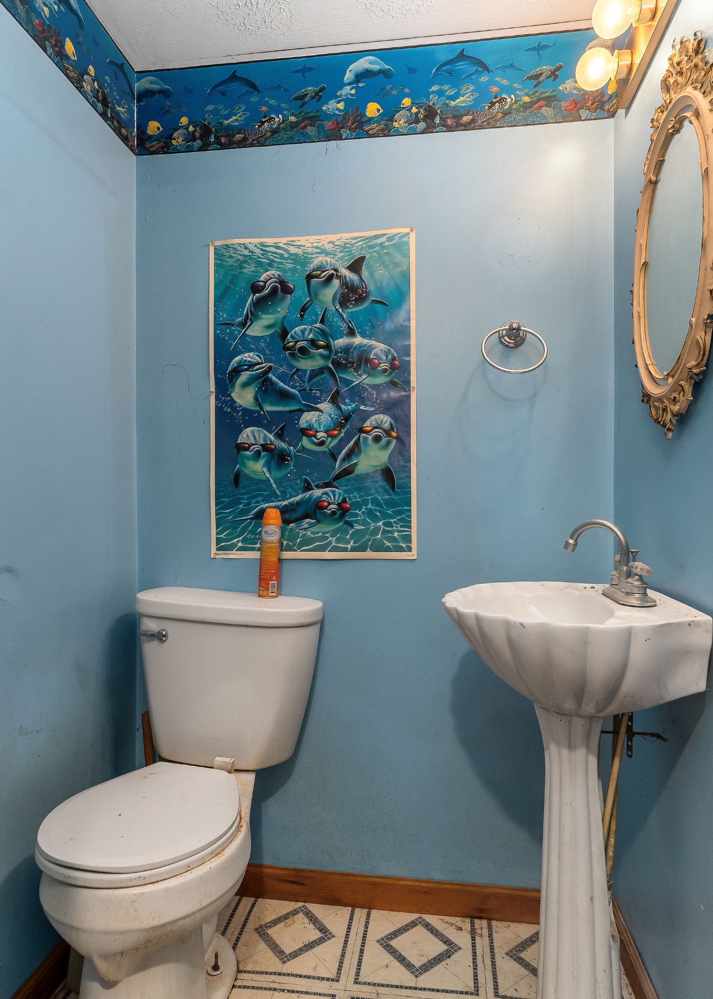 5980 Ashburn Road Baxter, TN 38544 - Photo 27 of 65 a bathroom with a toilet sink and mirror