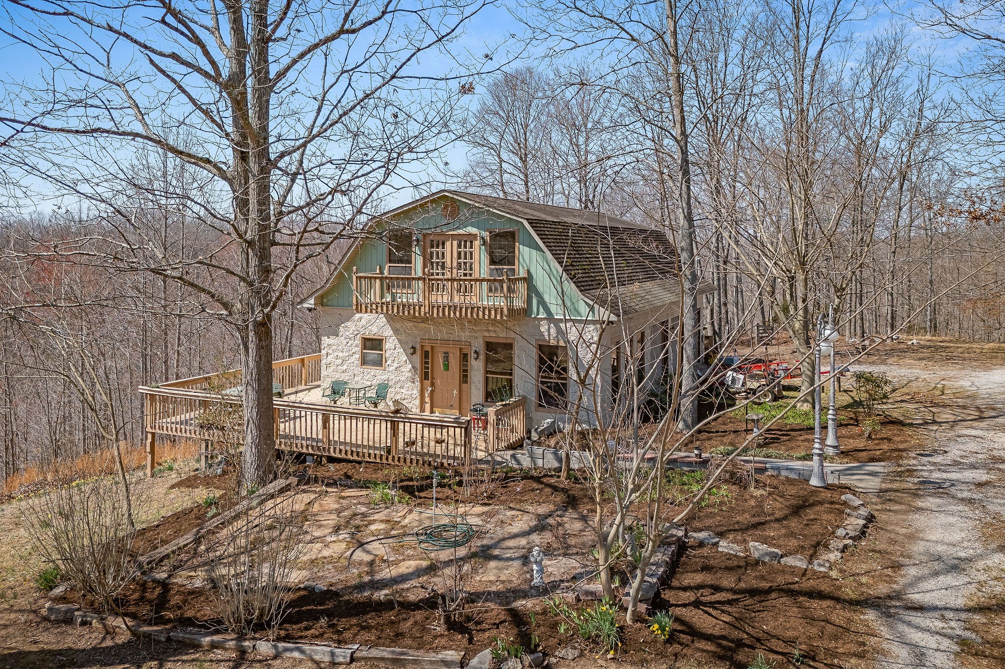 5980 Ashburn Road Baxter, TN 38544 - Photo 3 of 65 a front view of a house with a yard