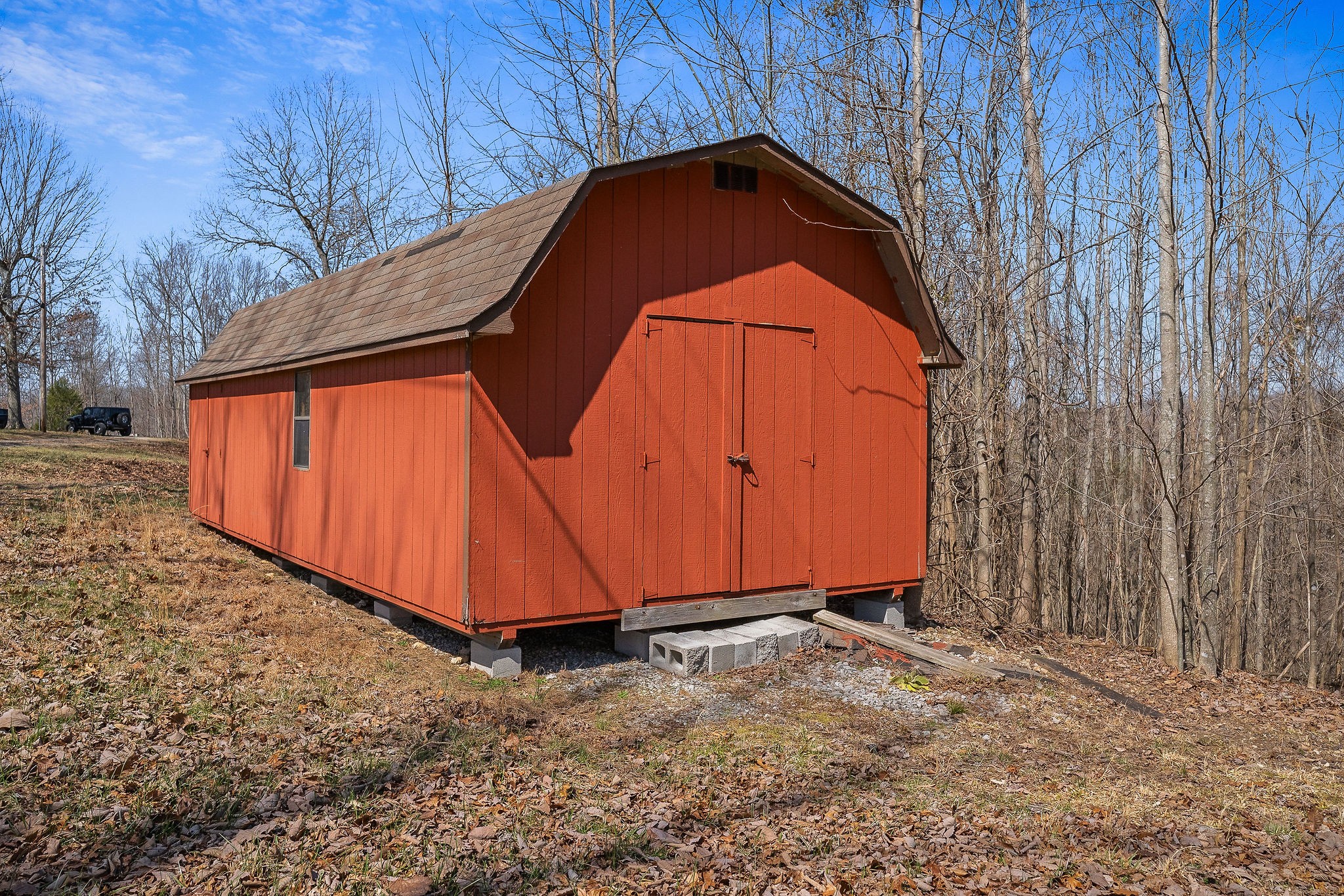 5980 Ashburn Road Baxter, TN 38544 - Photo 50 of 65 a view of backyard with tub and wooden fence