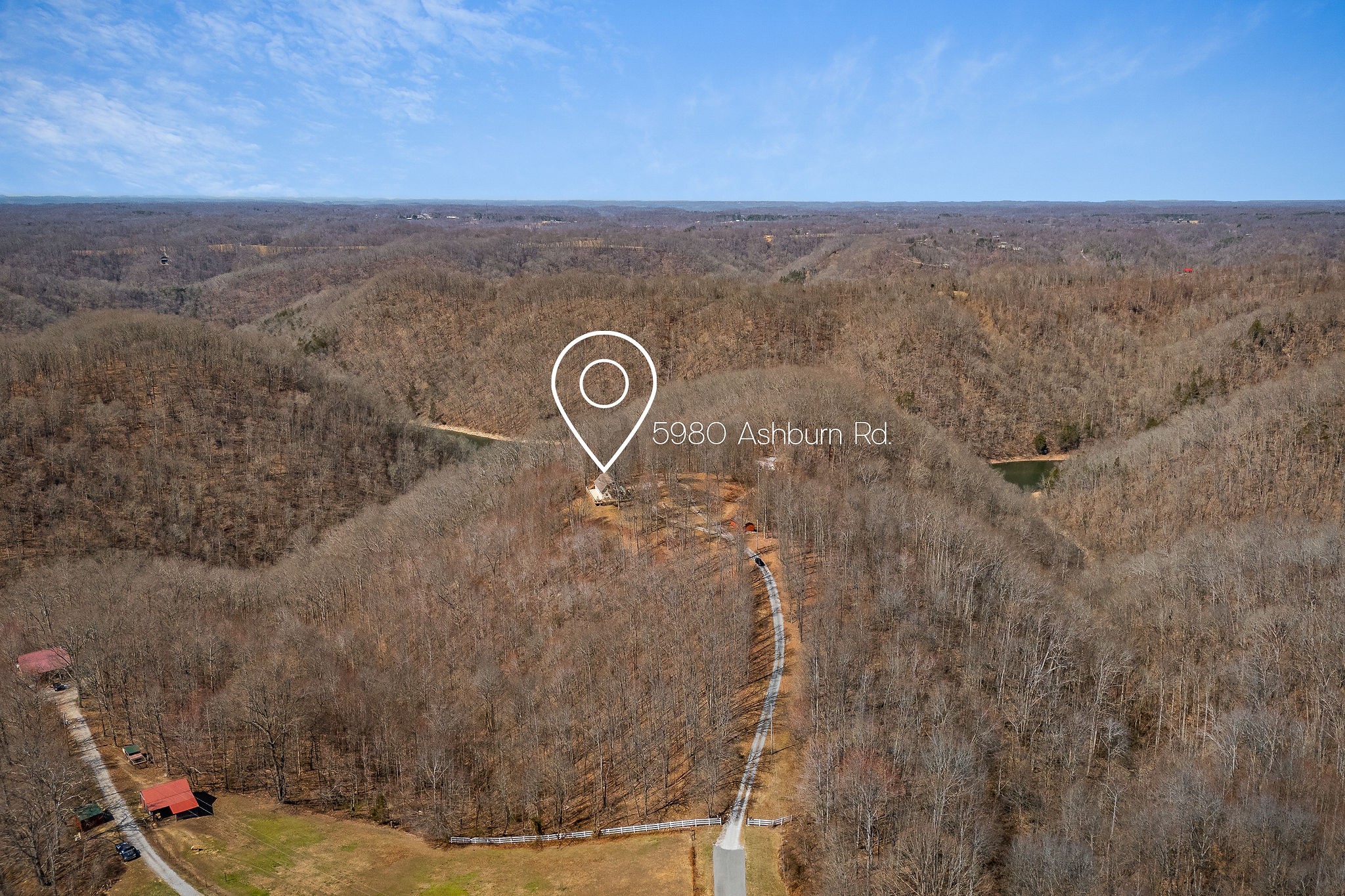 5980 Ashburn Road Baxter, TN 38544 - Photo 56 of 65 a view of a dry yard with wooden fence