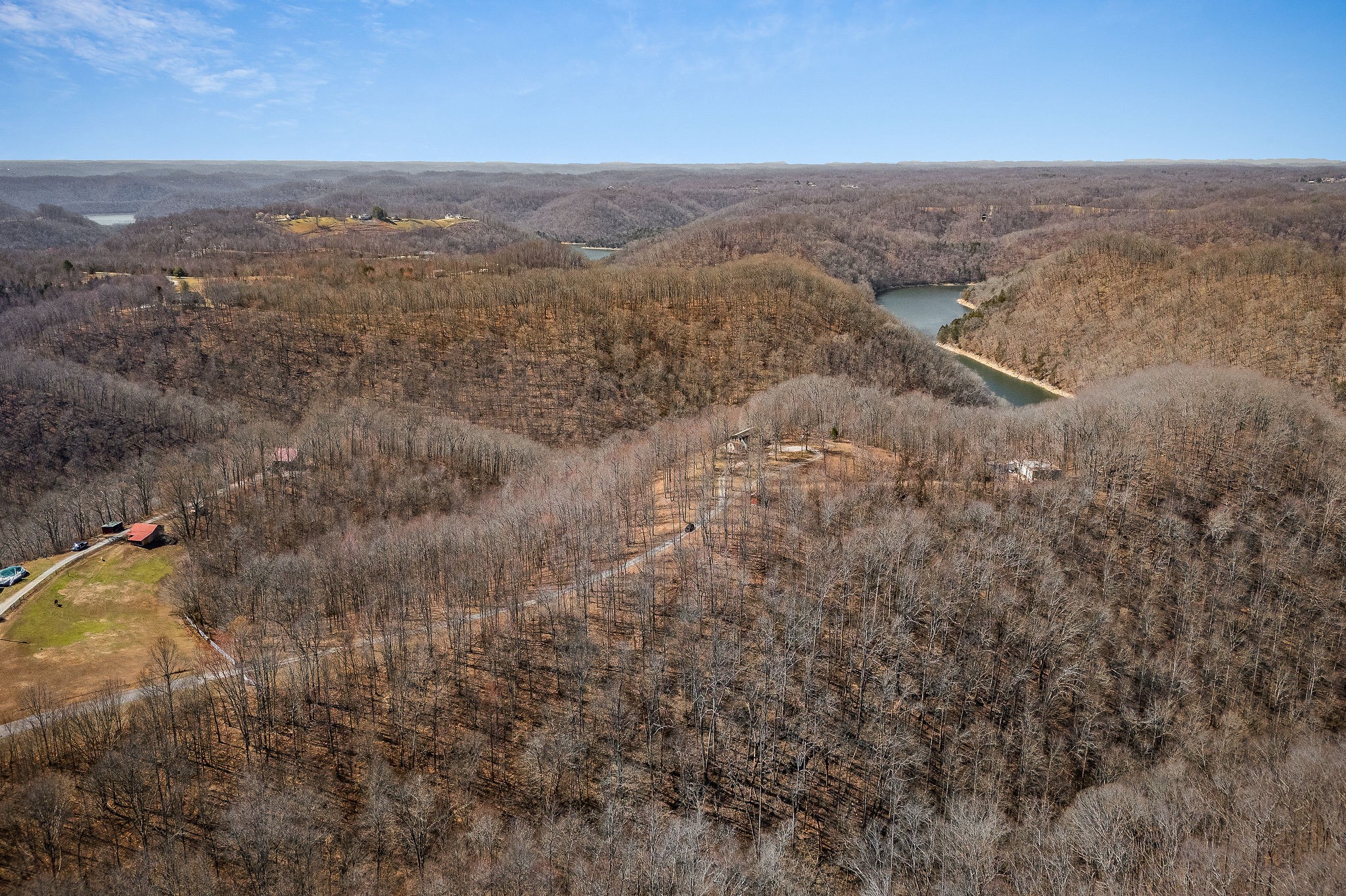 5980 Ashburn Road Baxter, TN 38544 - Photo 58 of 65 an aerial view of house with yard and mountain in the background