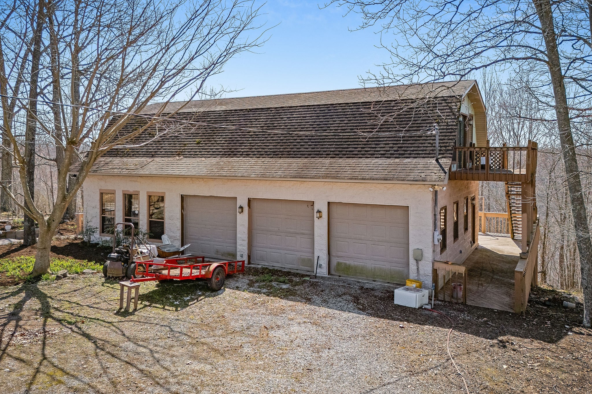 5980 Ashburn Road Baxter, TN 38544 - Photo 7 of 65 a backyard of a house with fire pit and couches