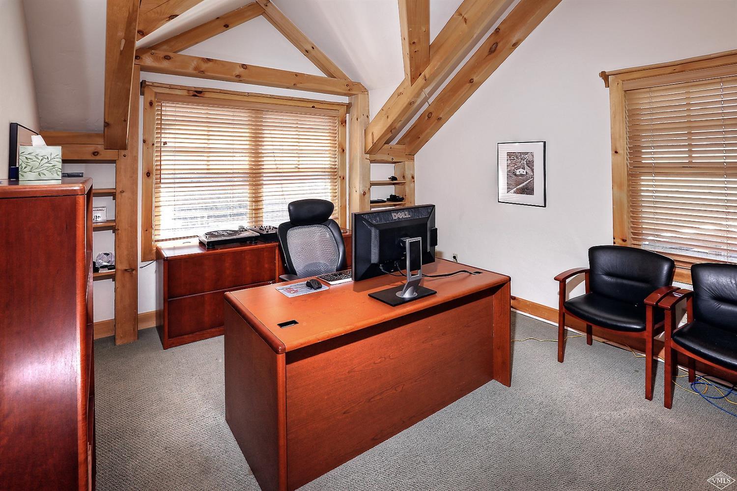 440 Eagle River Street Minturn, CO 81645 - Photo 15 of 24 a view of a workspace with furniture and a window