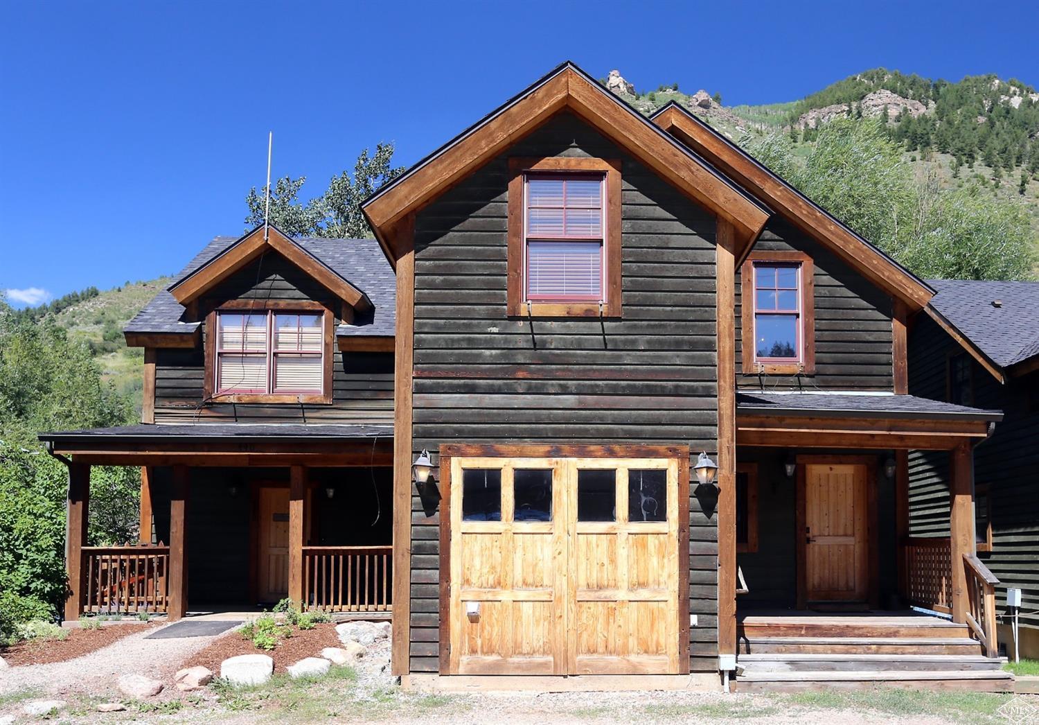 440 Eagle River Street Minturn, CO 81645 - Photo 9 of 24 a view of a house and a yard