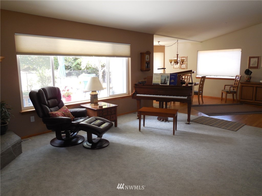 190 Booth Lane Sequim, WA 98382 - Photo 8 of 32 a view of a workspace with furniture and a window