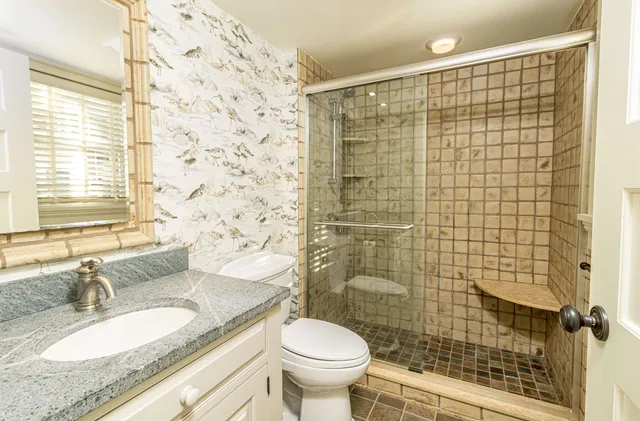 a living room with furniture fireplace and a flat screen tv
