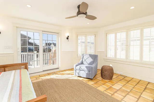 a view of a balcony with furniture