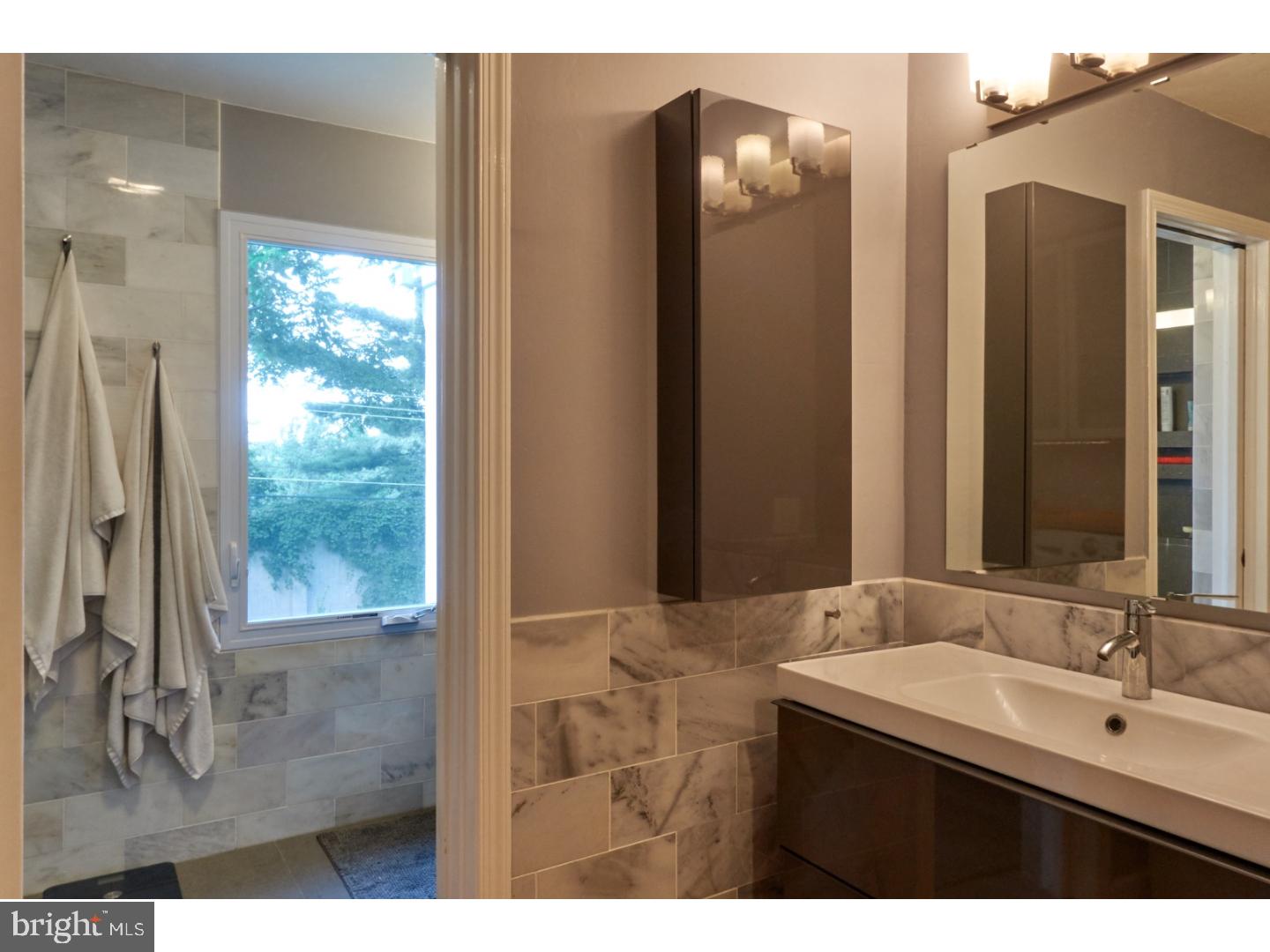 720 Panorama Road Villanova, PA 19085 - Photo 11 of 19 a bathroom with a sink and a mirror