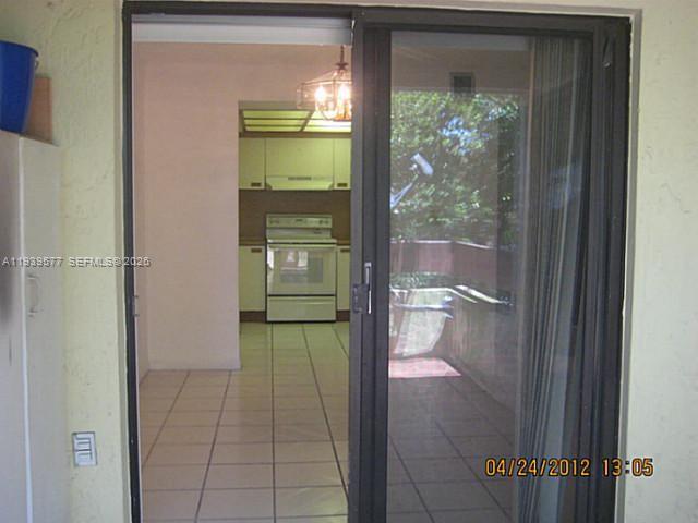 9015 Southwest 125th Avenue, Unit N406 Miami, FL 33186 - Photo 18 of 24 a bathroom with a bathtub