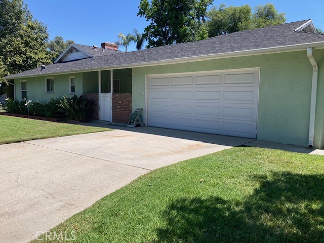 4948 Granada Avenue Riverside, CA 92504 - Photo 4 of 33 a front view of a house having yard