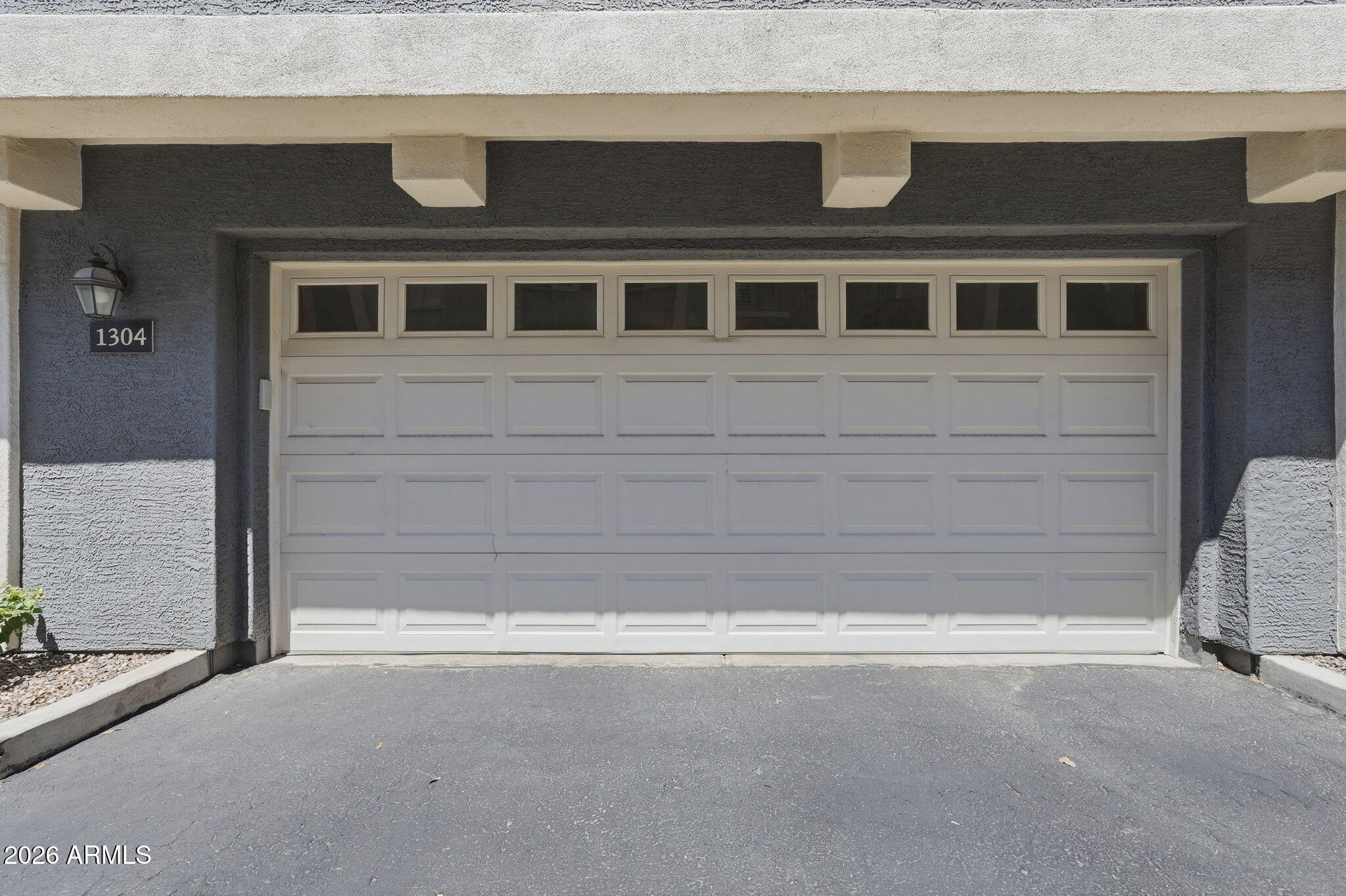 280 South Evergreen Road, Unit 1304 Tempe, AZ 85288 - Photo 22 of 25 Garage Door