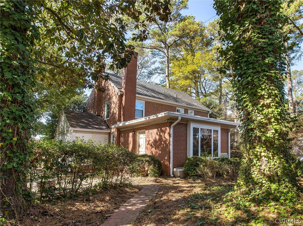 7114 Three Chopt Road Richmond, VA 23226 - Photo 27 of 31 Rear view of home with bonus room addition and office addition