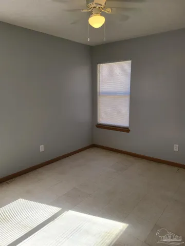 a view of a room with a window