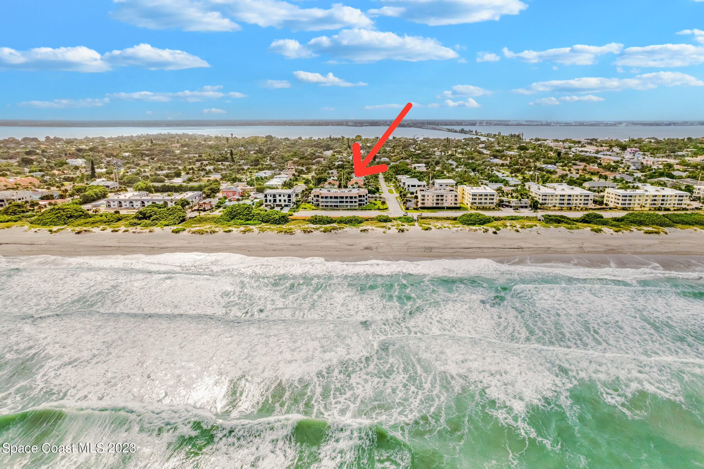 700 Wave Crest Avenue, Unit 202 Indialantic, FL 32903 - Photo 2 of 29 a view of an outdoor space with city view