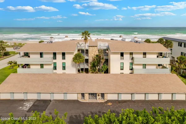 a view of a swimming pool and a yard