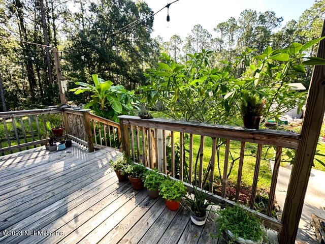 1504 Raiford Road Starke, FL 32091 - Photo 16 of 24 a view of balcony with wooden floor