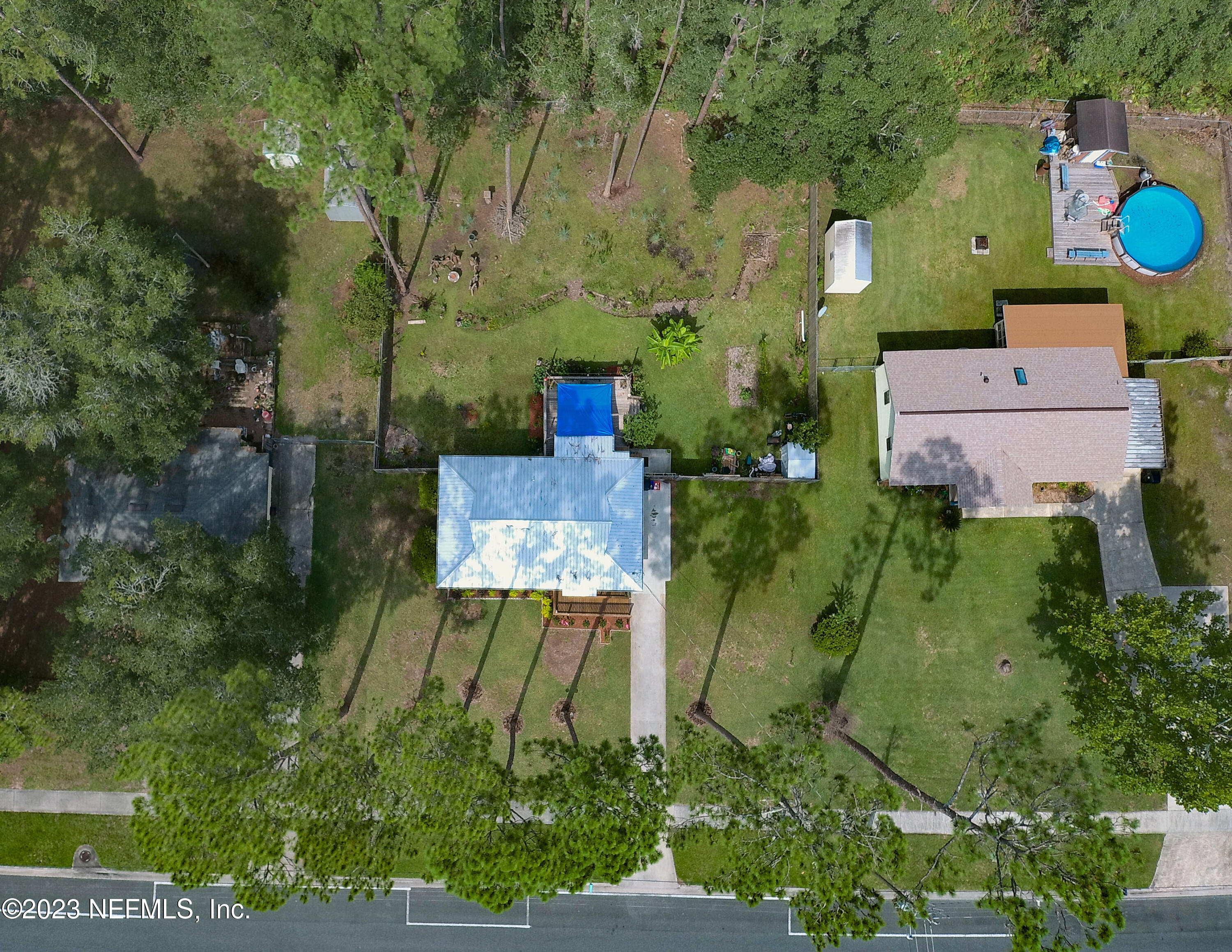 1504 Raiford Road Starke, FL 32091 - Photo 21 of 24 an aerial view of a house with a garden