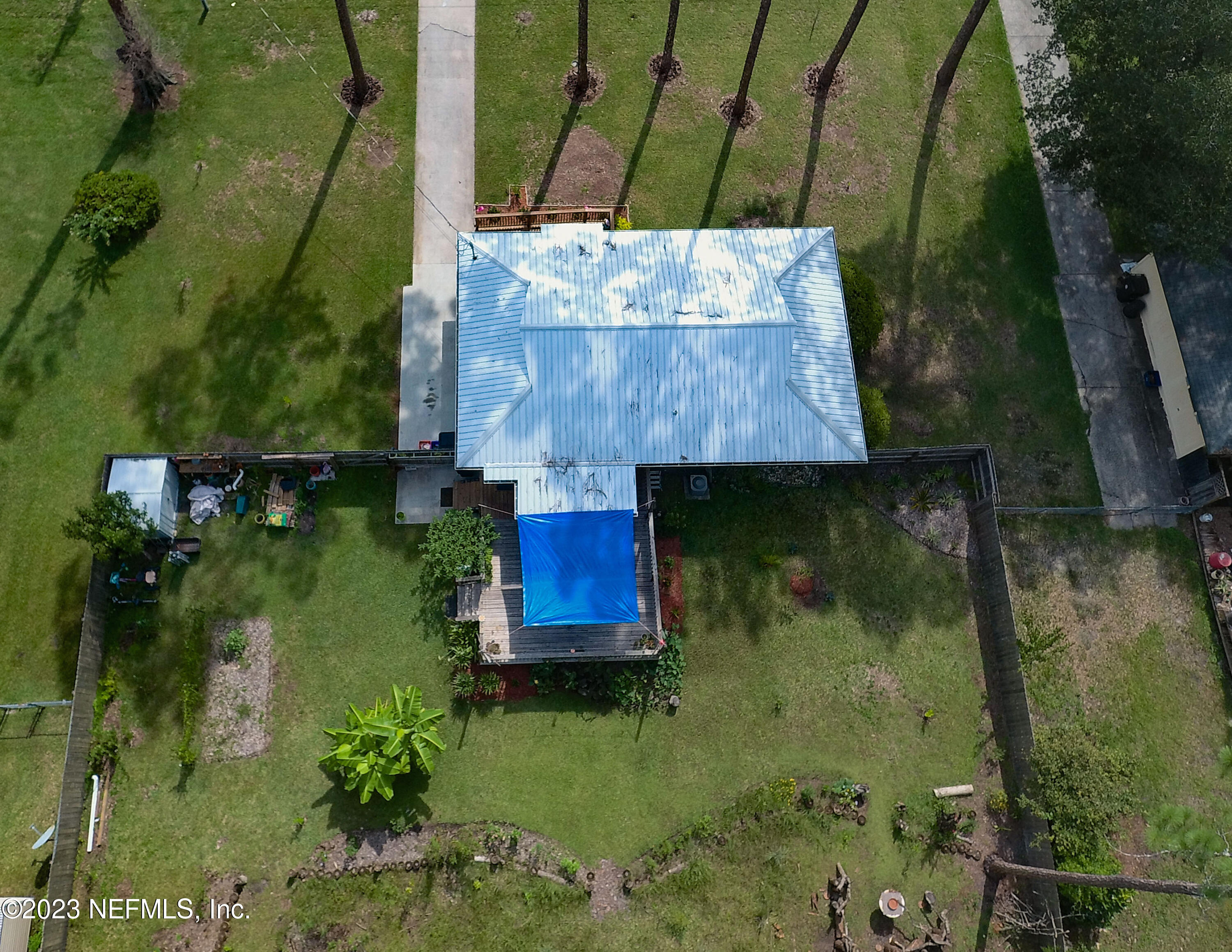 1504 Raiford Road Starke, FL 32091 - Photo 22 of 24 an aerial view of residential houses with outdoor space