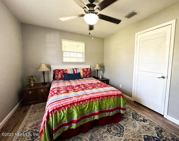 1504 Raiford Road Starke, FL 32091 - Photo 9 of 24 a bedroom with a bed and a window