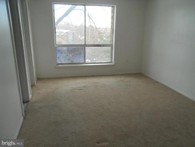 3964 Bel Pre Road, Unit 4 Silver Spring, MD 20906 - Photo 5 of 8 Master Bedroom
