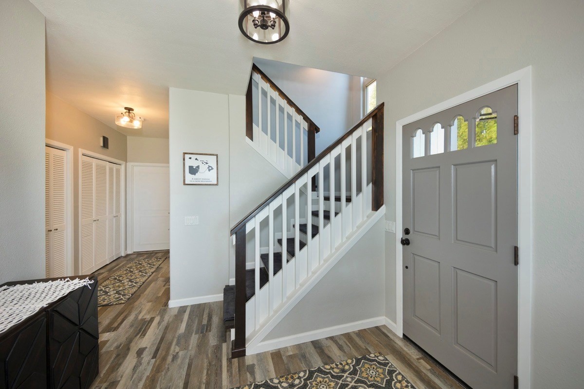 2104 Kaiwiki Road Hilo, HI 96720 - Photo 13 of 27 a view of entryway with wooden floor and stairs