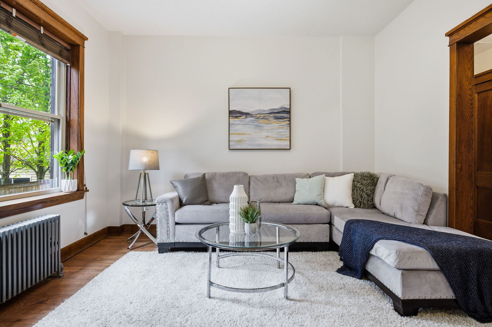 2920 West Altgeld Street, Unit 2 Chicago, IL 60647 - Photo 6 of 22 a living room with furniture and a window
