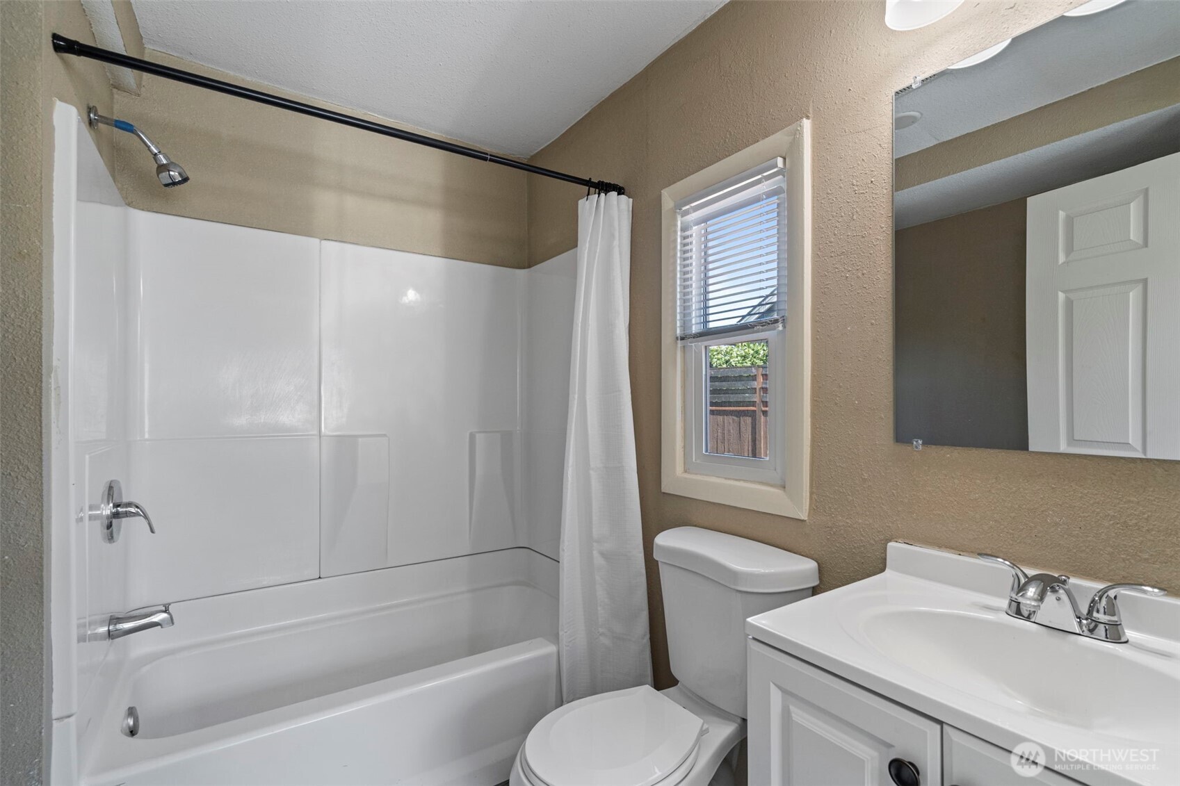 714 G Street Centralia, WA 98531 - Photo 21 of 40 a bathroom with a sink toilet and shower