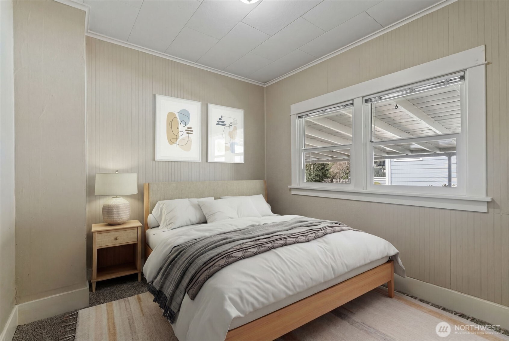 714 G Street Centralia, WA 98531 - Photo 7 of 40 a bedroom with a bed and a window