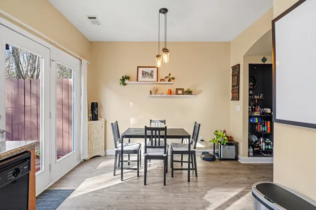 a view of a dining room with furniture