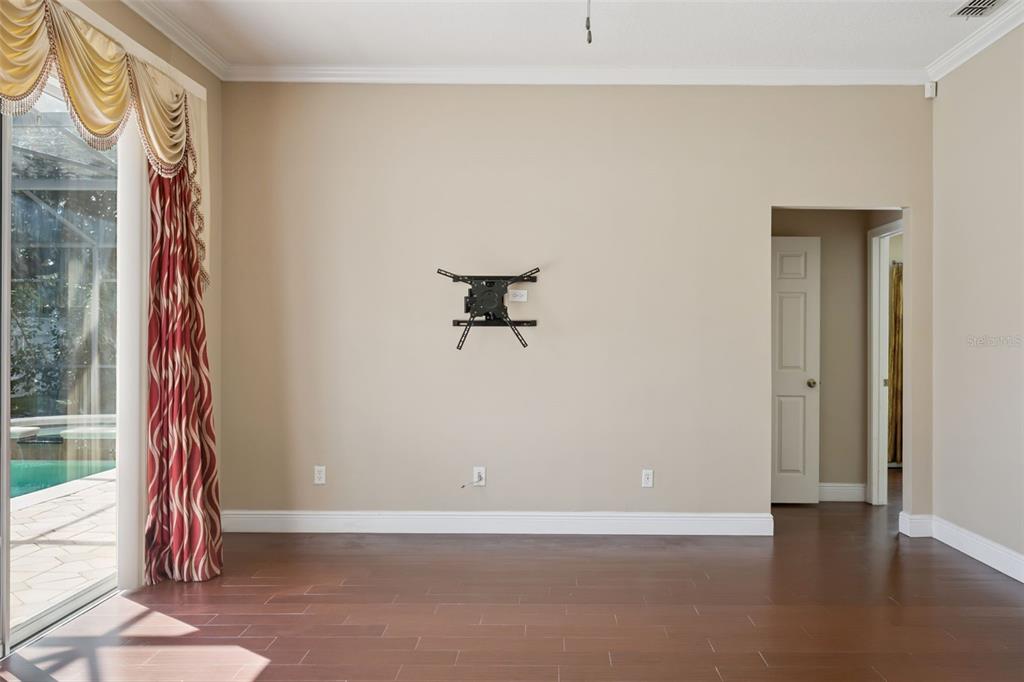 11450 Arborside Bend Way Windermere, FL 34786 - Photo 19 of 50 a view of a room with rack on the wall and a window