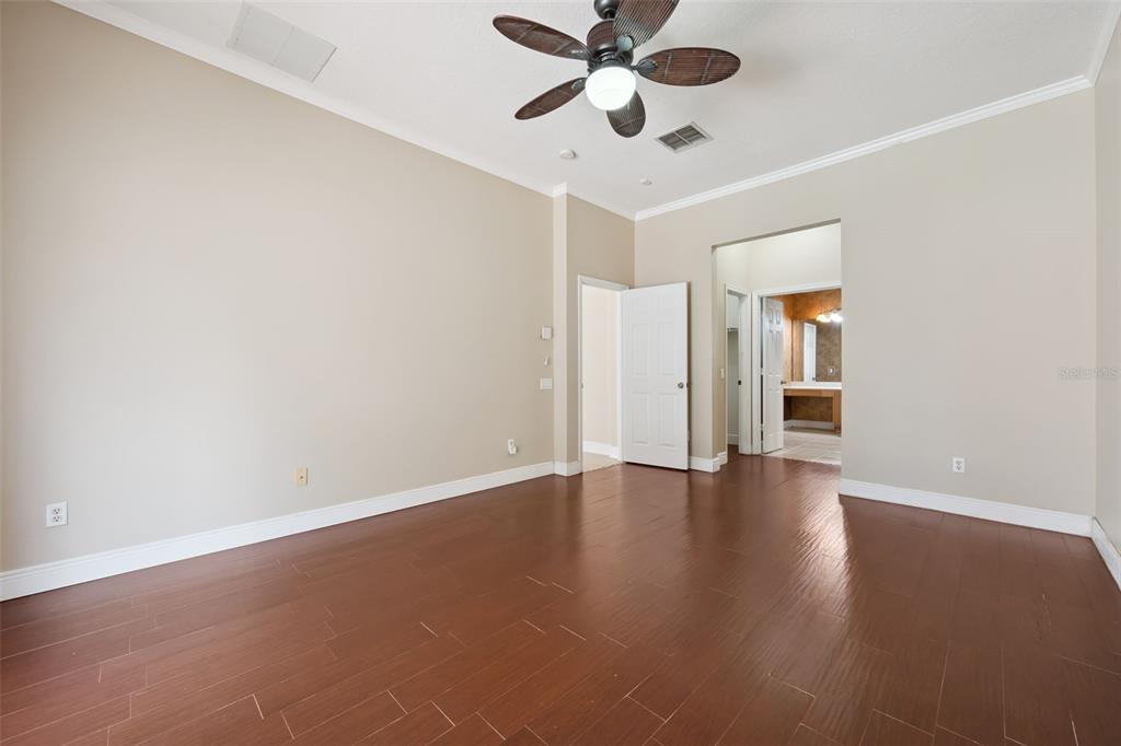 11450 Arborside Bend Way Windermere, FL 34786 - Photo 24 of 50 a view of an empty room with window and wooden floor