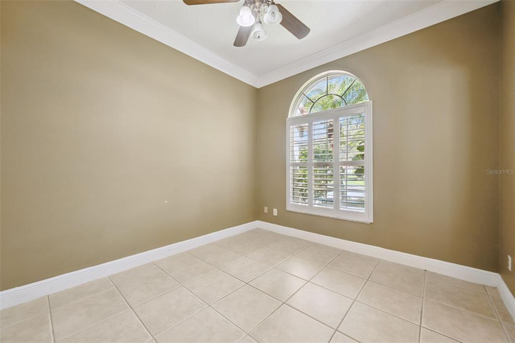 11450 Arborside Bend Way Windermere, FL 34786 - Photo 29 of 50 a view of an empty room with a window