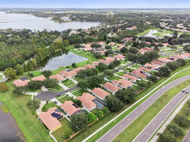 an aerial view of city and lake view