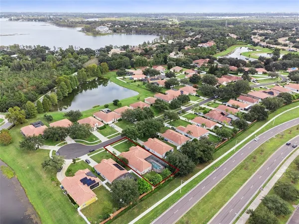 an aerial view of city and lake view