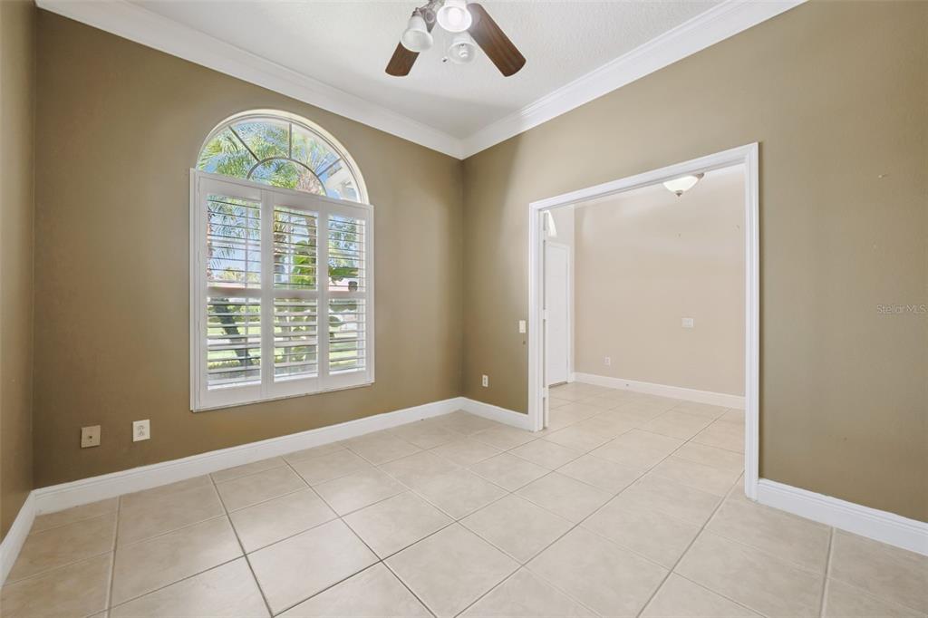11450 Arborside Bend Way Windermere, FL 34786 - Photo 6 of 50 an empty room with fan and windows