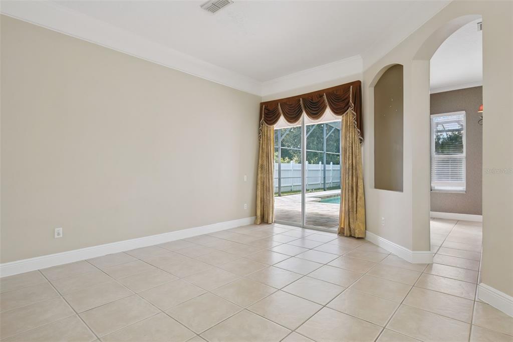 11450 Arborside Bend Way Windermere, FL 34786 - Photo 10 of 50 a view of an empty room with glass door