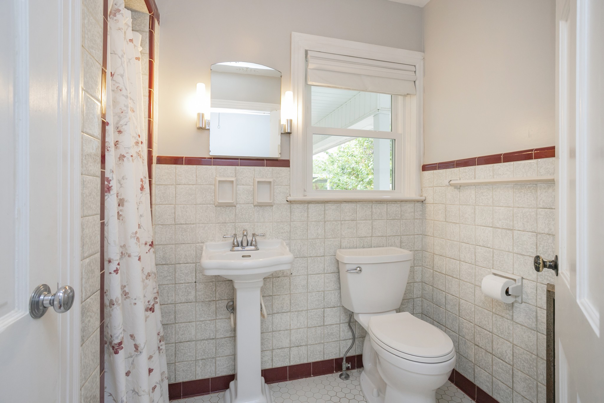 105 Echo Road Dickson, TN 37055 - Photo 15 of 32 a bathroom with a toilet sink and shower