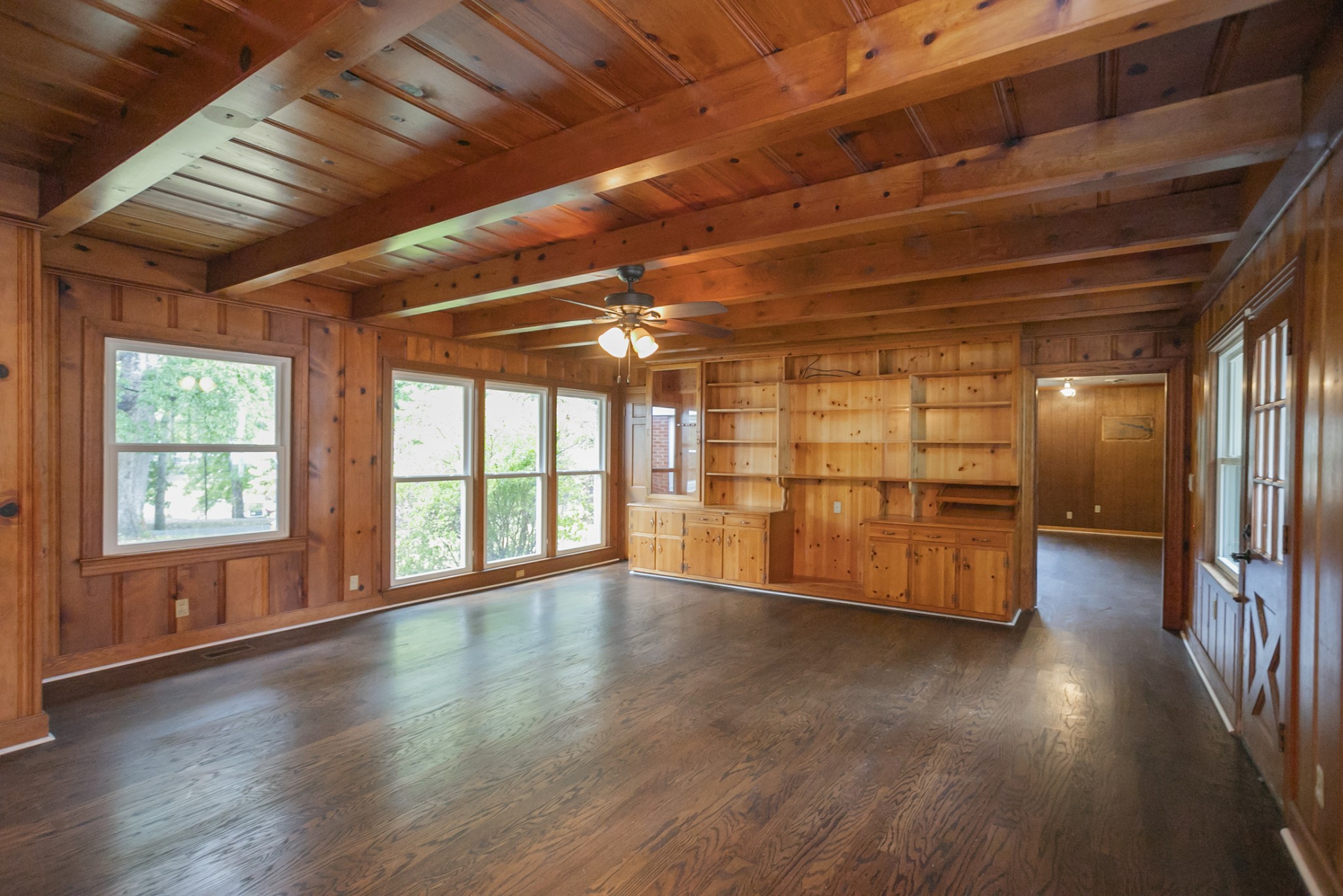 105 Echo Road Dickson, TN 37055 - Photo 18 of 32 a view of an empty room with wooden floor and a window