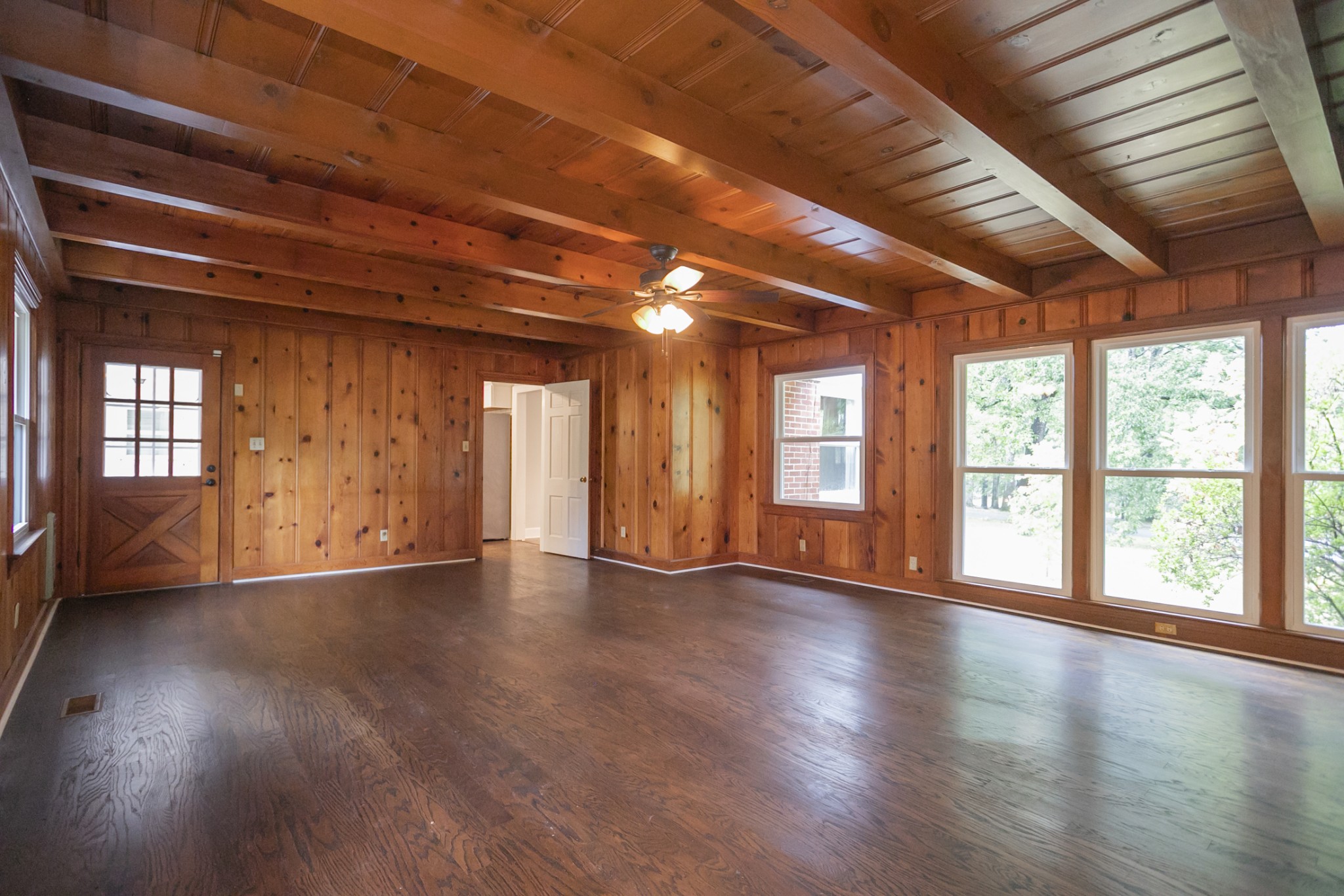 105 Echo Road Dickson, TN 37055 - Photo 19 of 32 a view of an empty room with wooden floor and a window