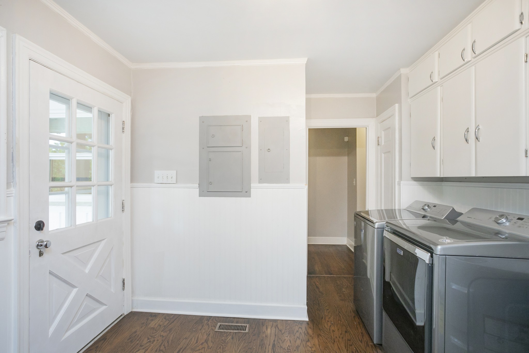 105 Echo Road Dickson, TN 37055 - Photo 9 of 32 a utility room with cabinets washer and dryer