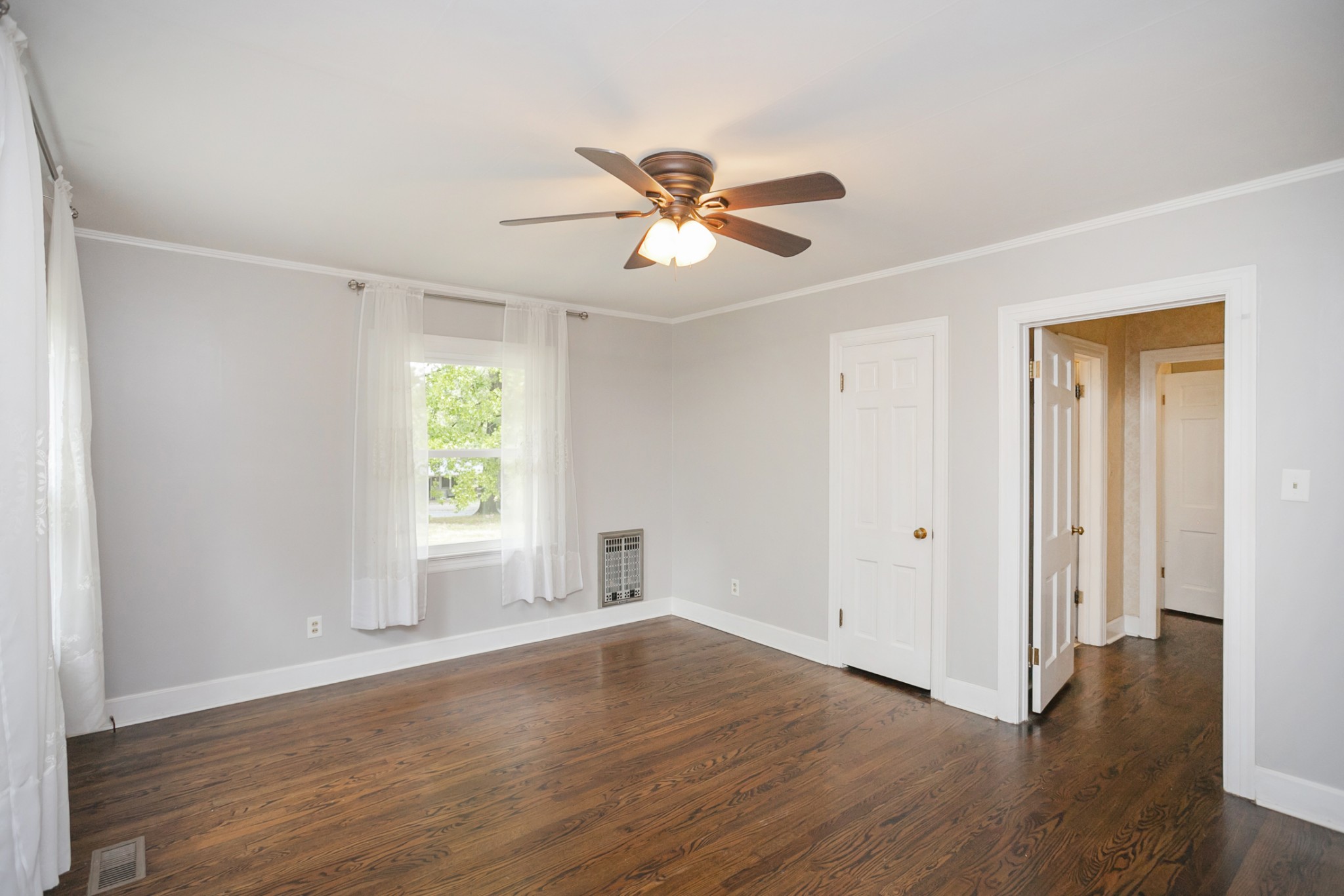 105 Echo Road Dickson, TN 37055 - Photo 10 of 32 a view of empty room with wooden floor and fan